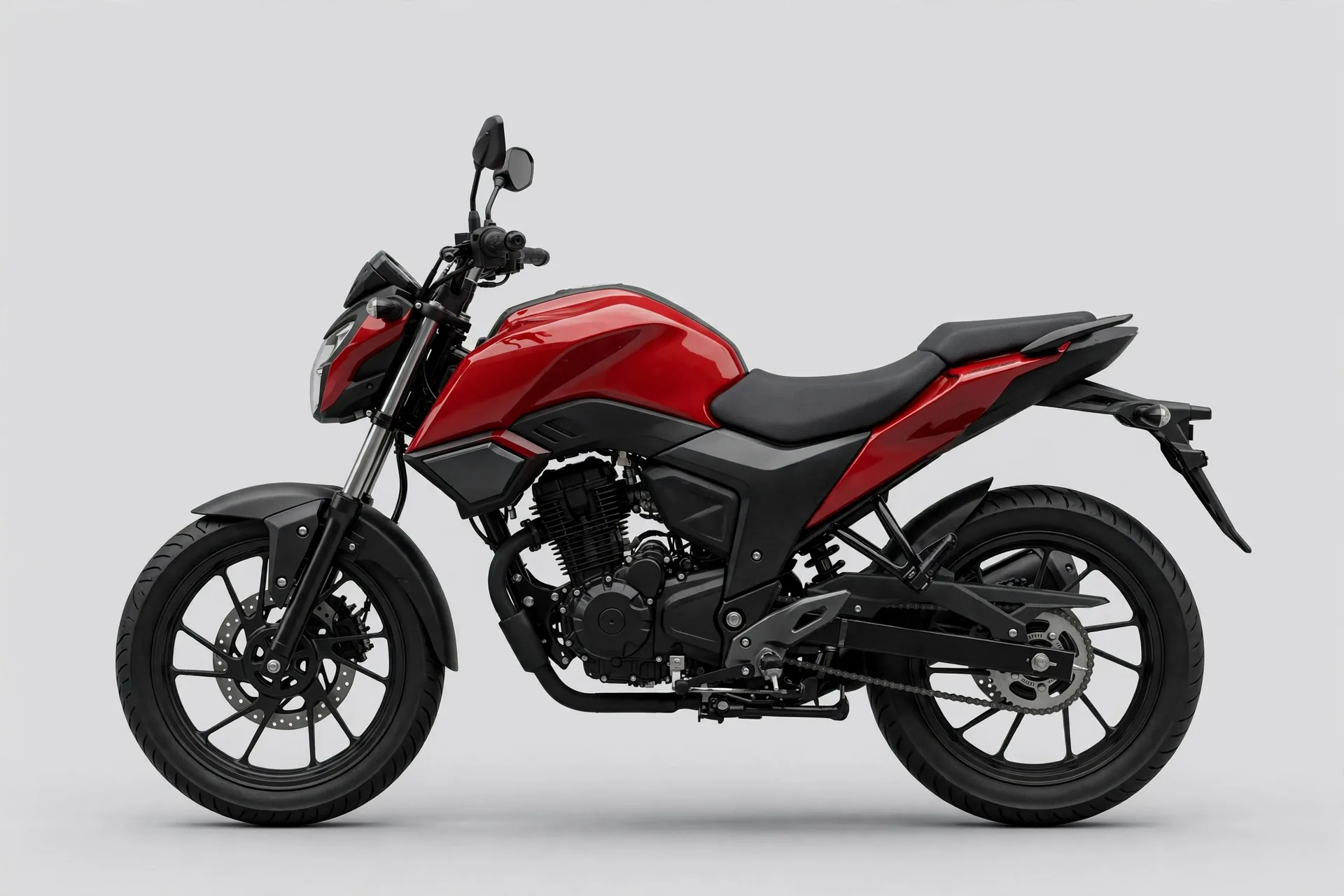 A red street motorcycle seen from the side